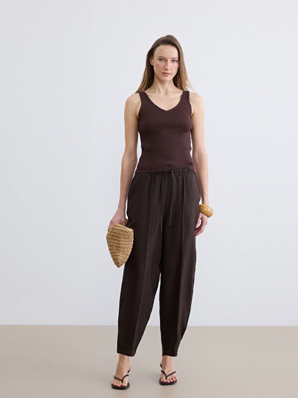 Moudda LC Waikiki - Pantalon fin en tissu pour Femme couleur Marron foncé - Tunisie 1