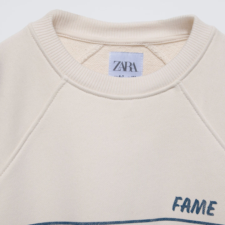 Moudda ZARA - Sweat coupe boxy, neutre avec rayures et imprimé - Tunisie 3