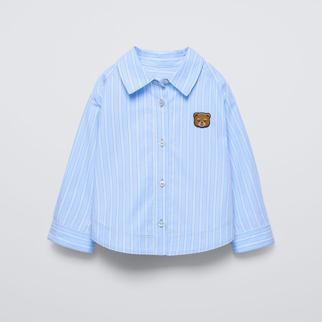 Moudda ZARA - Chemise rayée bleue patch ours - Tunisie 1